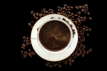 Obraz premium cup of black coffee with foam on background of roasted coffee beans