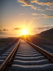 Naklejka premium sunset in the railway