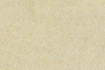 Recycled brown paper texture or paper background. Closeup light brown paper detail for design with copy space for text or image.