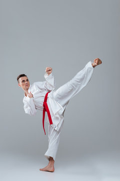 Sportsman in kimono practice in karate