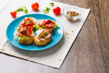 Bruschetta with salmon and bacon
