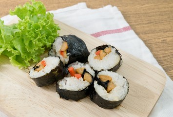 Veggie Sushi Rolls or Vegetable Maki on Wooden Tray