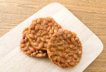 Thai Peanut Cracker on A Wooden Board