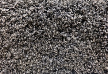 Detail of Black Fluffy Fabric Texture Background