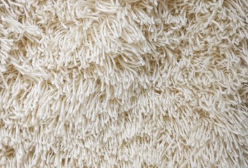 Detail of Cream Fluffy Fabric Texture Background