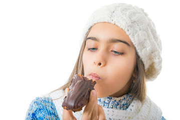  Girl  Eating Sugary Donut. Girl eating Cake in winter,  
 Portrait of beautiful girl with  chocolate donut. Girl teenager biting Cake, Tasty unprofitable food for schoolchildren. 
 - obrazy, fototapety, plakaty