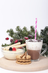 Hot chocolate in a cup and biscuits