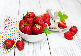 ripe strawberries on wooden table