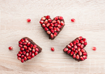 Heart shaped food - Brownie cake for Valentines day party, art dessert idea, top view. Valentines day background.