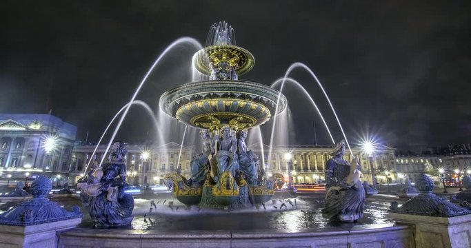 Time lapse view of a fountain at night in Place de la Concorde in Paris