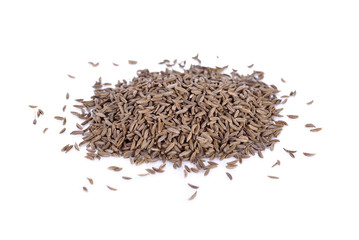 pile of caraway seeds on white background