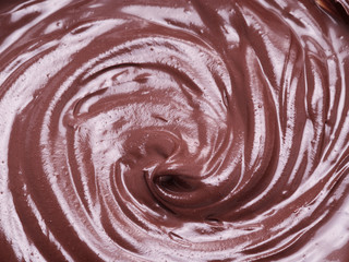 Melted chocolate or chocolate glaze.
