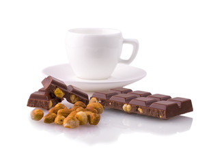 mug of coffee and chocolate with nuts