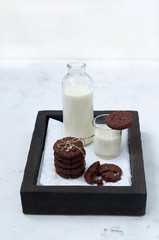 Breakfast chocolate milk and cookies on white background
