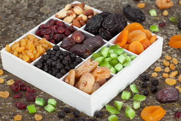 Assortment of dried fruit in wooden boxes