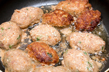cutlets fried in a pan