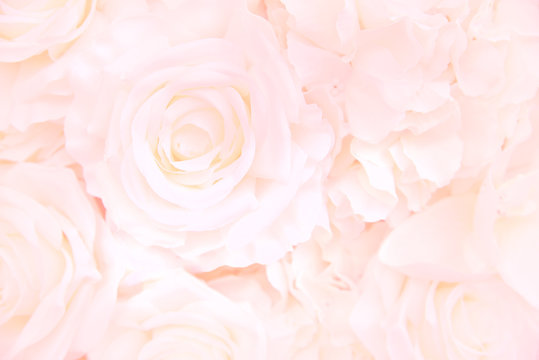 Decoration artificial Pink roses flower bouquet as a floral background with soft focus and copy space.