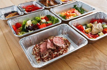 Healthy food in boxes, diet concept.