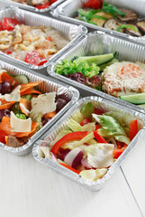 Healthy food in boxes, diet concept.
