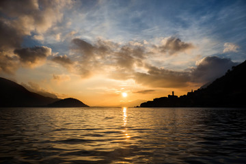 Fototapeta na wymiar Sun setting on Lake Iseo in Italy