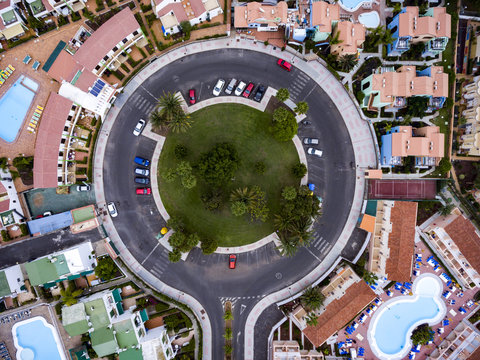 Aerial view of traffic circle and houses