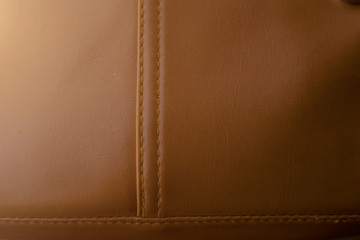 Bag brown leather with seam close up