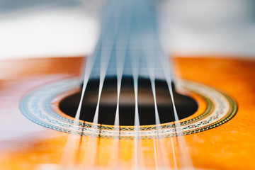 detail of classic guitar with very shallow depth of field