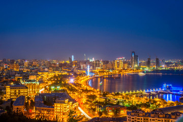 Naklejka na ściany i meble View over Baku at night, Azerbaijan