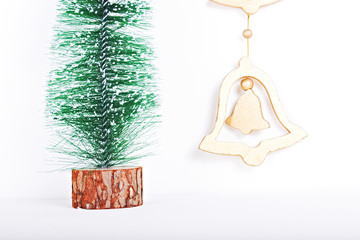 Christmas tree and bells on white background