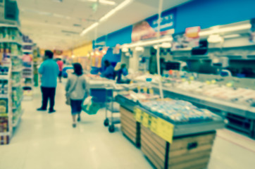 Abstract blurred photo of store with trolley in department store