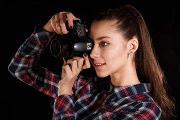 Young girl with a camera