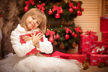 child holding a magic Christmas gift box 