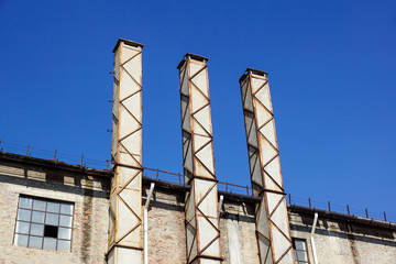 cement chimney of an ancient brick factory .old industrial area abandoned