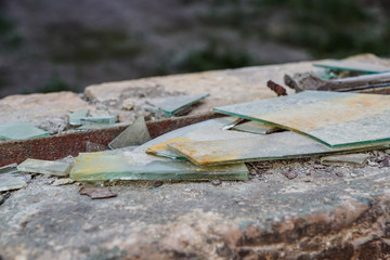 destroyed window in an abandoned office building