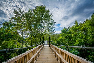 Fototapeta na wymiar Bridge over Little Sugar Creek, at Freedom Park, in Charlotte, N