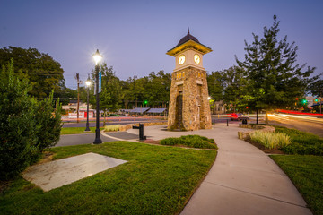 Clock tower at night, along the Little Sugar Creek Greenway, in