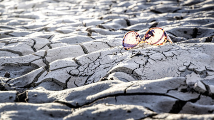 Lake Bed:  Lost sunglasses I found sitting at the bottom of the  drained Tempe townlake in Tempe, AZ