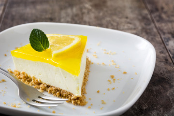 Lemon pie on wooden background
