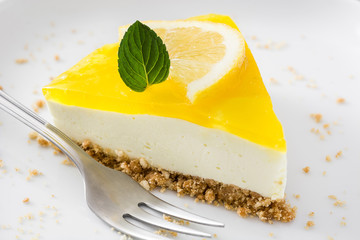 Lemon pie on wooden background
