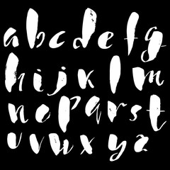 Hand drawn font made by dry brush strokes. Grunge style alphabet