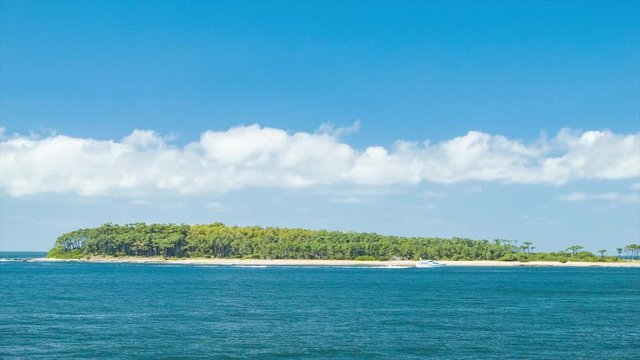 Punta del Este Watersports around South American Beach Island Destination during Sunny Day with Passing Boats and Jet Skis