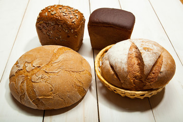 Bread on a white wooden background