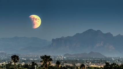 Supermoon/Lunar Eclipse rises over the Superstition Mountains:  Mesa, Arizona