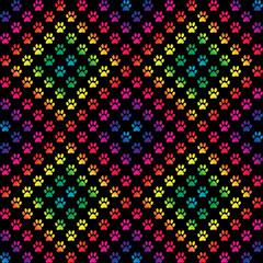 Obraz premium Paw prints in gradient rainbow colors in a diamond pattern, on black background, a seamless pattern