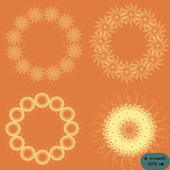 Four vector patterned wreaths.