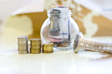 Money in a glass jar.