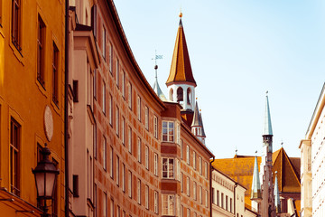 Fototapeta na wymiar Traditional street view of old buildings in Munich, Bavaria, Ger