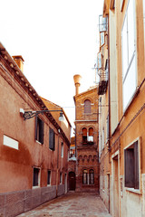 Fototapeta premium Traditional street view of old buildings in Venice, ITALY