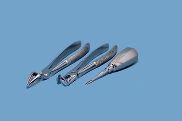 Set of metal dental tools for tooth extraction