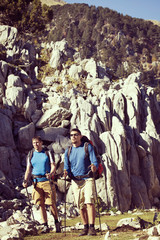 Fototapeta premium Summer hiking in the mountains on a sunny day.